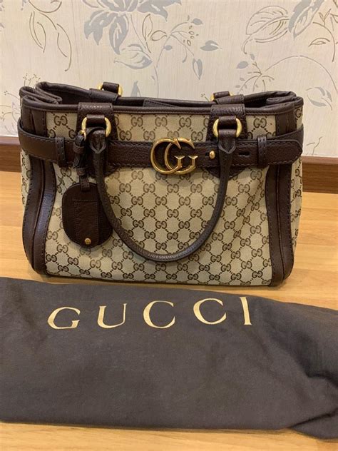 gucci pocketbooks used